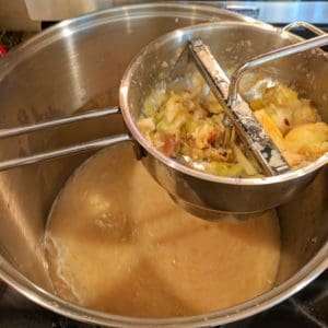 Making applesauce with a food mill