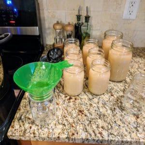 Filling mason jars with funnel