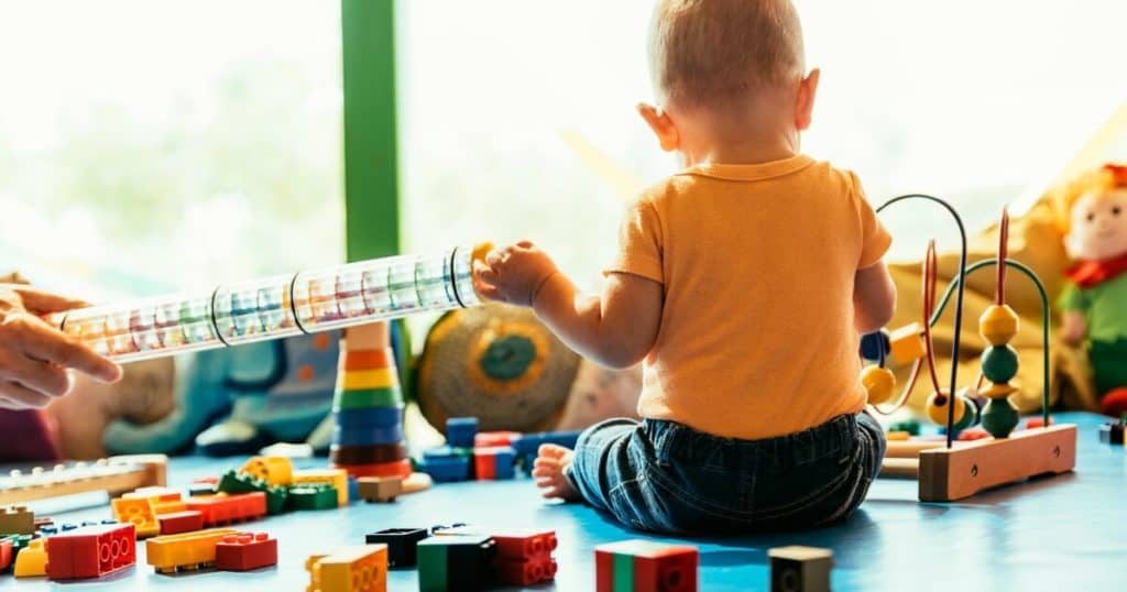 Baby playing with toys