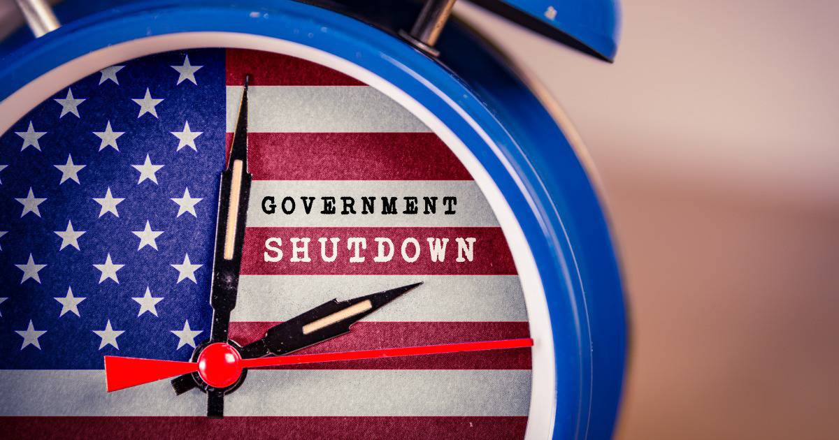 Clock counting time of government shutdown and how it impacted one family's budget