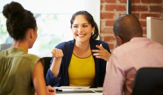 Couple Meeting With Accountant about Taxes In Office