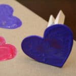 foam heart attached to clothes pin for Valentine's Crafts with kids