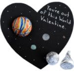 space inspired Valentine's Day craft for kids with Superball and Hershey's Kisses