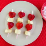 Heart shaped strawberries and bananas on skewer for Valentine's Day with kids