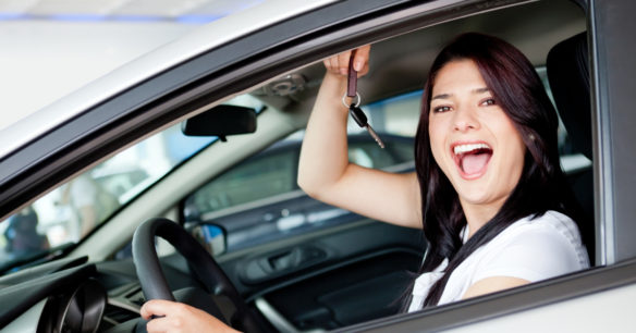 woman excited after buying a car