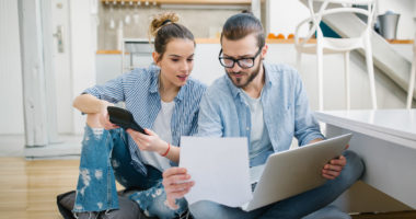 couple looking at bills