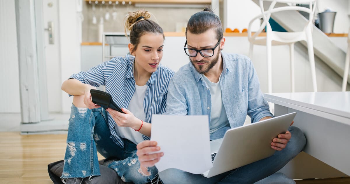 couple looking at bills