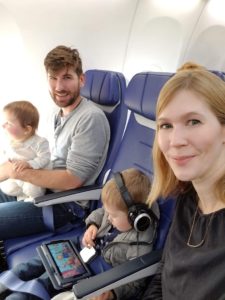 Family on a plane relocating to new home